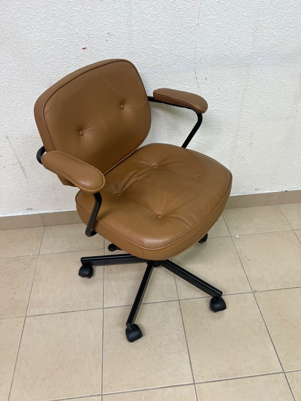 The ALEFJÄLL office chair from IKEA, crafted from golden-brown "Grann" leather and featuring distinctive tufted button detailing. - Image 7