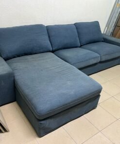 IKEA "KIVIK" sectional sofa, featuring a textured blue fabric. - Image 6