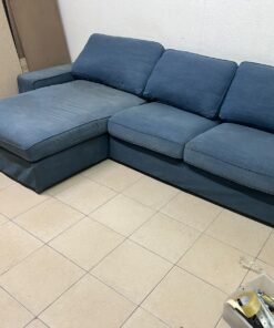 IKEA "KIVIK" sectional sofa, featuring a textured blue fabric. - Image 2