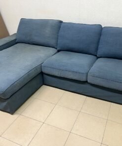 IKEA "KIVIK" sectional sofa, featuring a textured blue fabric. - Image 4