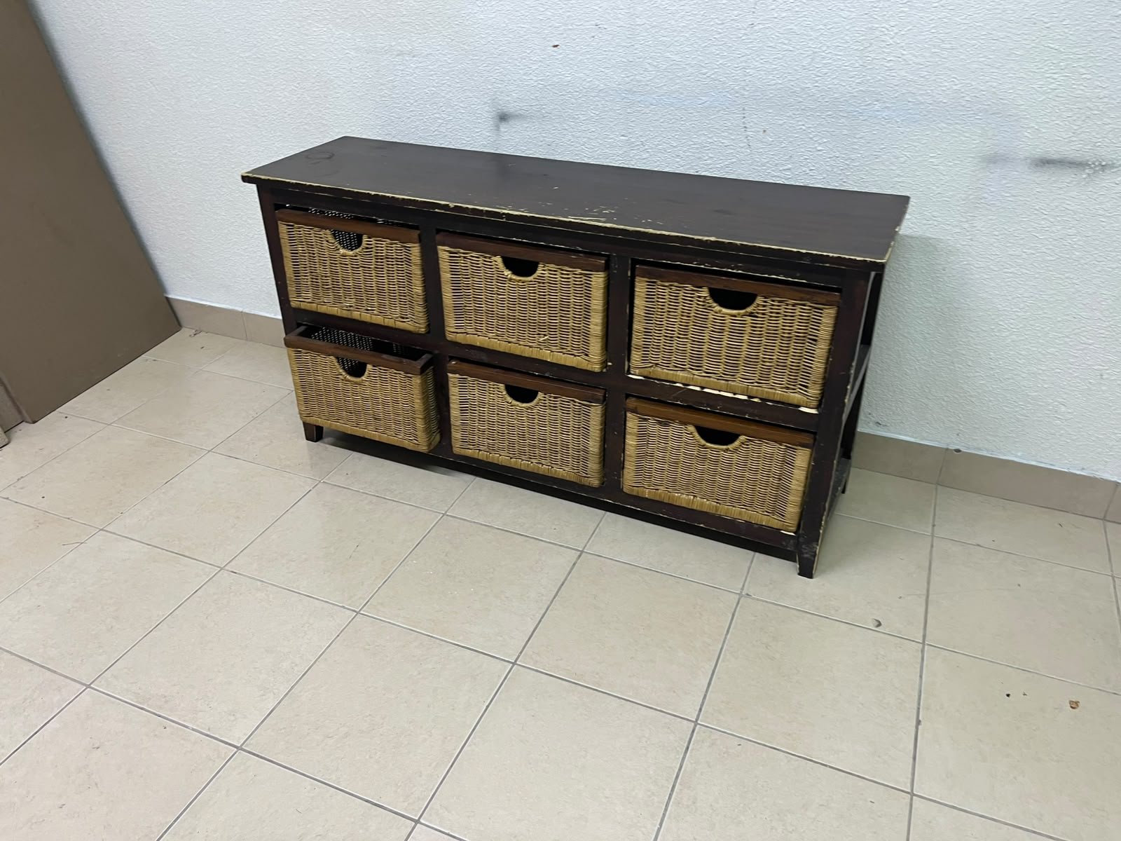 A dark brown wooden storage unit featuring six drawers in the form of woven bamboo baskets. - Image 4