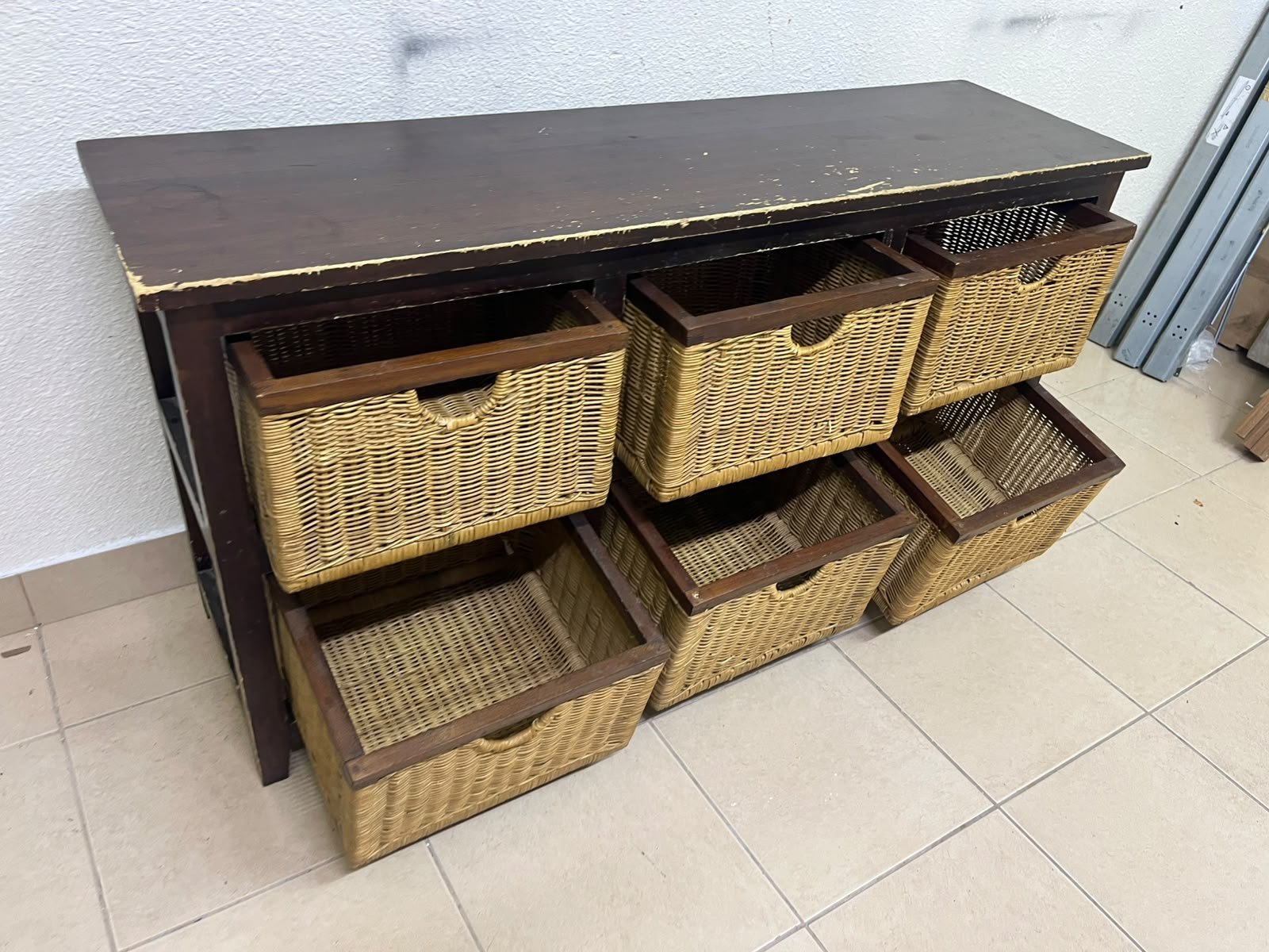 A dark brown wooden storage unit featuring six drawers in the form of woven bamboo baskets. - Image 7