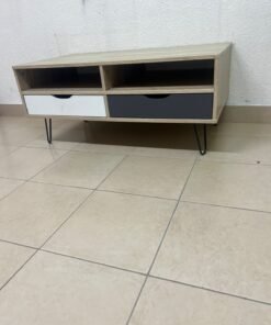 The "Maxton" coffee table from Home Center features a wood-effect finish, slender black hairpin legs, and two contrasting drawers. - Image 8