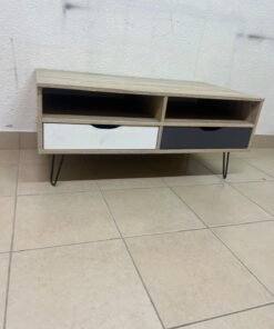The "Maxton" coffee table from Home Center features a wood-effect finish, slender black hairpin legs, and two contrasting drawers. - Image 9
