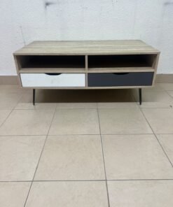 The "Maxton" coffee table from Home Center features a wood-effect finish, slender black hairpin legs, and two contrasting drawers. - Image 2