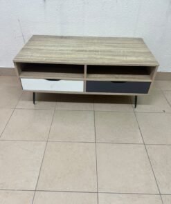 The "Maxton" coffee table from Home Center features a wood-effect finish, slender black hairpin legs, and two contrasting drawers. - Image 3