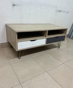 The "Maxton" coffee table from Home Center features a wood-effect finish, slender black hairpin legs, and two contrasting drawers. - Image 5