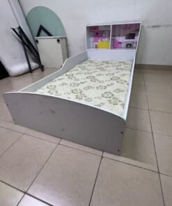 A white wooden single bed for children, featuring an integrated "dollhouse-style" headboard decorated with illustrations of miniature rooms. - Image 3