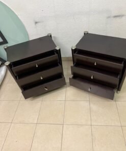 A pair of modern dark-wood bedside cabinets featuring three drawers, curved fronts, silver-colored handles, and elegant metal legs. - Image 3