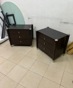 A pair of modern dark-wood bedside cabinets featuring three drawers, curved fronts, silver-colored handles, and elegant metal legs. - Image 4