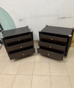 A pair of modern dark-wood bedside cabinets featuring three drawers, curved fronts, silver-colored handles, and elegant metal legs. - Image 5