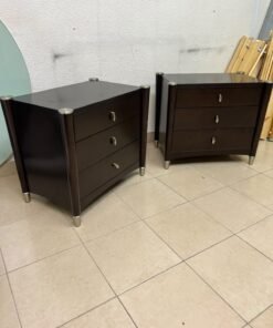 A pair of modern dark-wood bedside cabinets featuring three drawers, curved fronts, silver-colored handles, and elegant metal legs. - Image 12