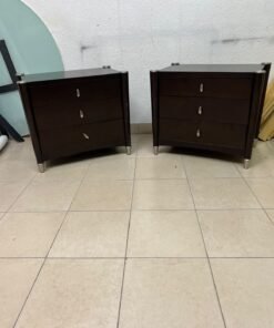 A pair of modern dark-wood bedside cabinets featuring three drawers, curved fronts, silver-colored handles, and elegant metal legs. - Image 11