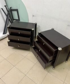 A pair of modern dark-wood bedside cabinets featuring three drawers, curved fronts, silver-colored handles, and elegant metal legs. - Image 10