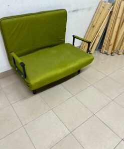 A multifunctional, foldable green sofa bed featuring black metal armrests and an adjustable backrest. - Image 5