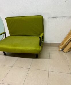 A multifunctional, foldable green sofa bed featuring black metal armrests and an adjustable backrest. - Image 6