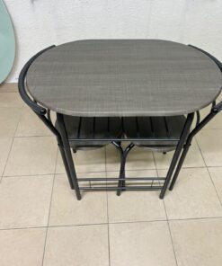 Two chairs and a table featuring an oval grey tabletop, a black tubular steel frame, and built-in storage shelves. - Image 6