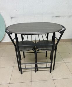 Two chairs and a table featuring an oval grey tabletop, a black tubular steel frame, and built-in storage shelves. - Image 7