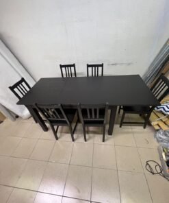 A dark solid wood dining table with matching slat-back chairs, featuring the design of the "Nordviken" collection from IKEA. - Image 14