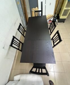 A dark solid wood dining table with matching slat-back chairs, featuring the design of the "Nordviken" collection from IKEA. - Image 8