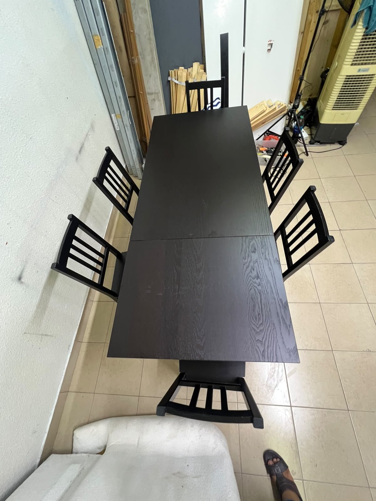 A dark solid wood dining table with matching slat-back chairs, featuring the design of the "Nordviken" collection from IKEA. - Image 8