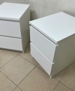 Two side tables (nightstands) with two drawers, featuring a white design similar to the famous IKEA MALM style.