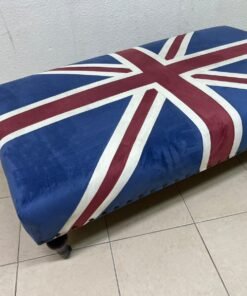 An Ottoman upholstered in luxurious velvet, featuring a vintage British flag design and metal stud detailing along the sides. - Image 10