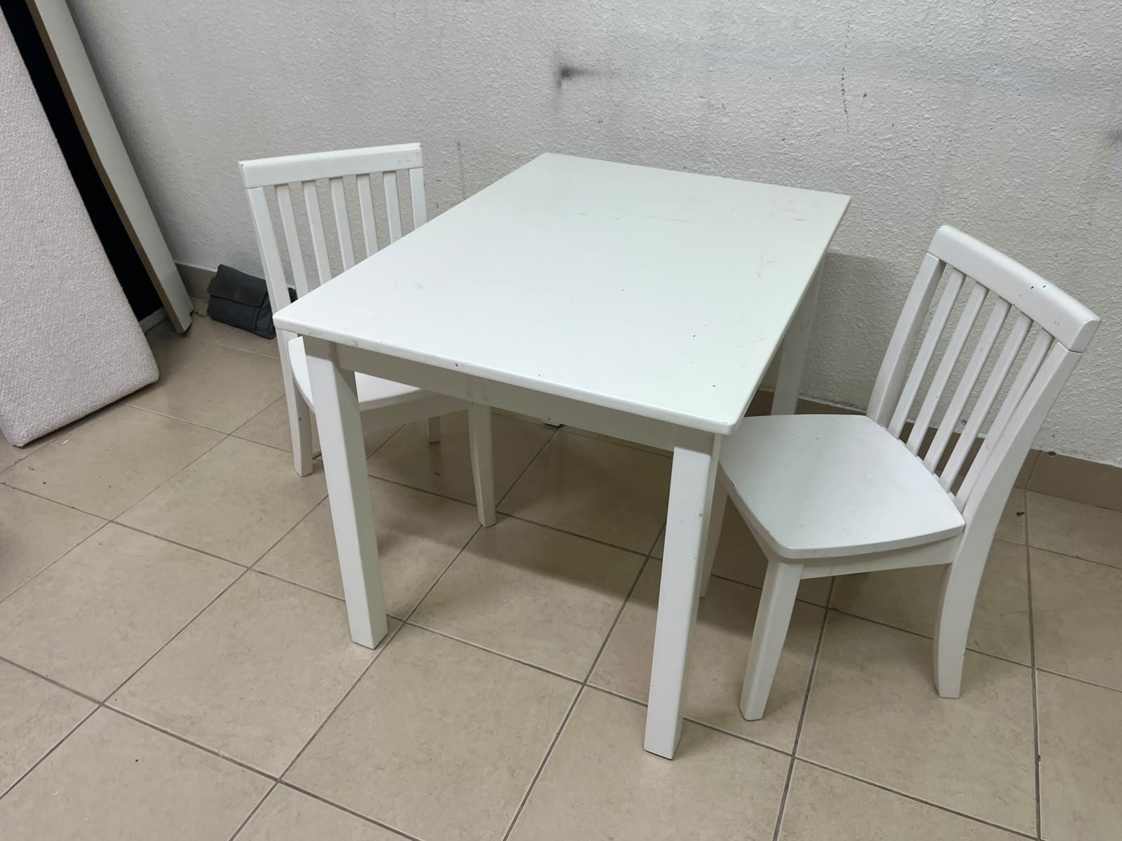 Home Centre children's table and two-chair set featuring a white wood design. - Image 10