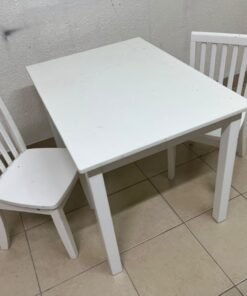 Home Centre children's table and two-chair set featuring a white wood design. - Image 11