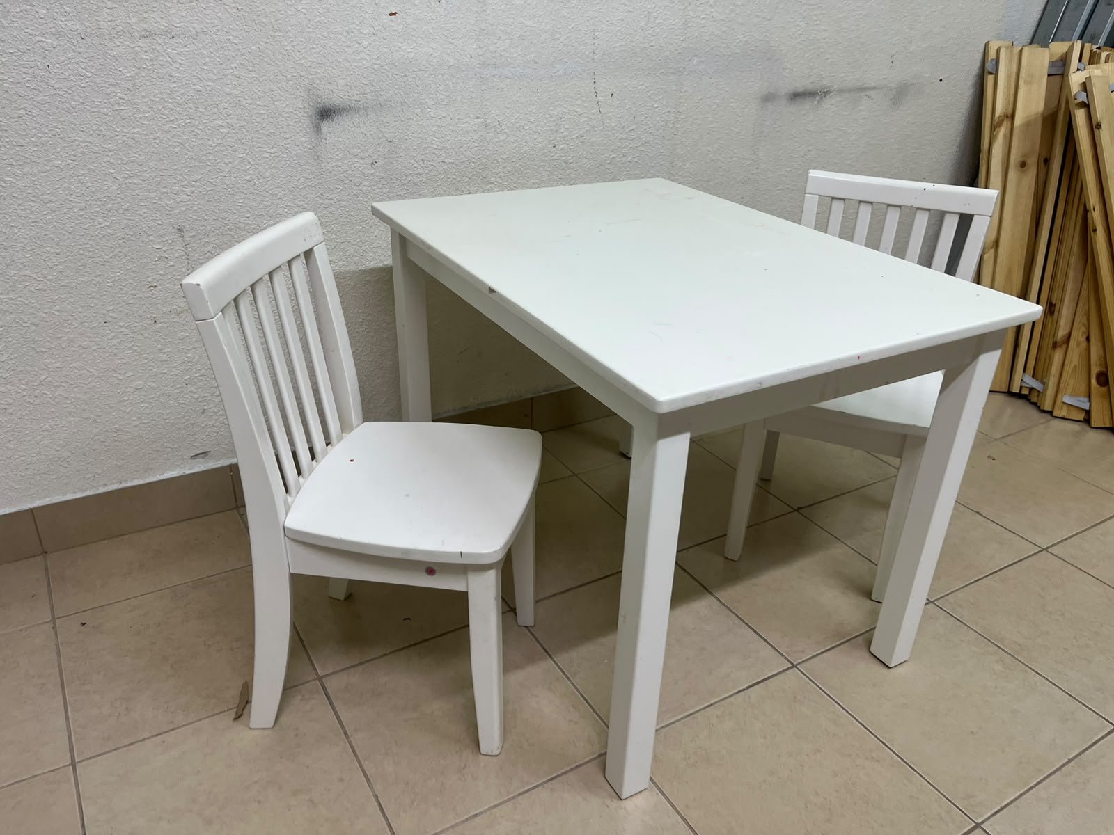Home Centre children's table and two-chair set featuring a white wood design. - Image 4