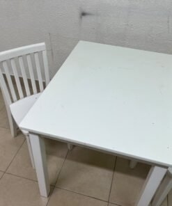 Home Centre children's table and two-chair set featuring a white wood design. - Image 6