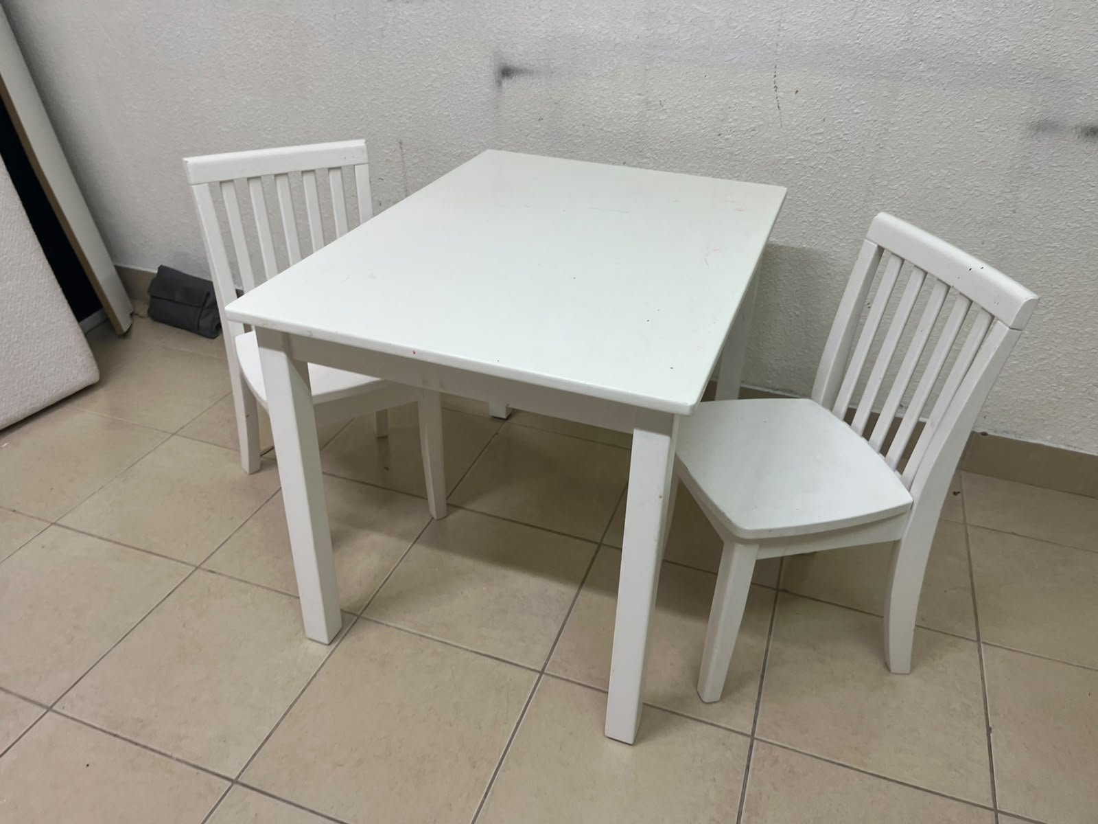 Home Centre children's table and two-chair set featuring a white wood design. - Image 7