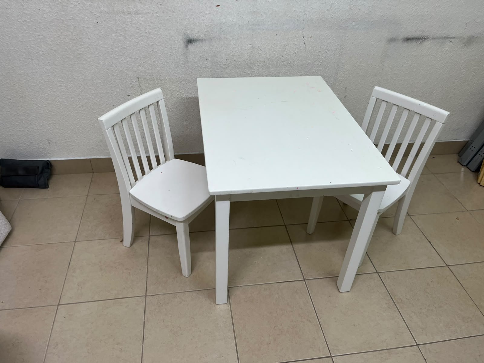 Home Centre children's table and two-chair set featuring a white wood design. - Image 8
