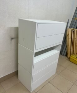 A white storage unit from IKEA’s EKET system, featuring a modular design that combines drawers with open storage space. - Image 4