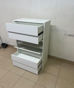 A white storage unit from IKEA’s EKET system, featuring a modular design that combines drawers with open storage space. - Image 8