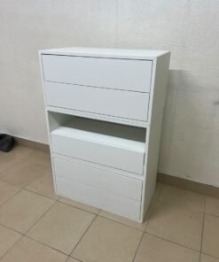 A white storage unit from IKEA’s EKET system, featuring a modular design that combines drawers with open storage space. - Image 6