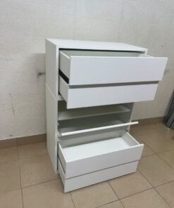 A white storage unit from IKEA’s EKET system, featuring a modular design that combines drawers with open storage space. - Image 5