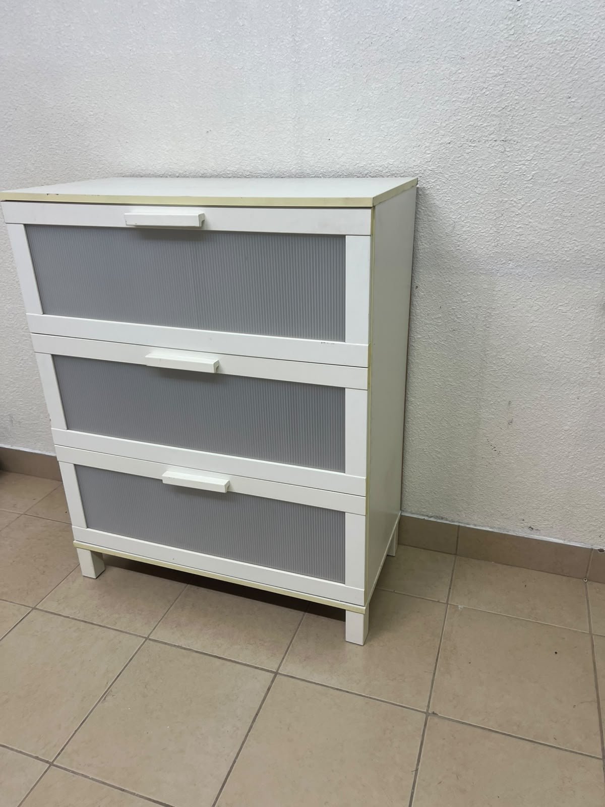 A white three-drawer chest with grey striped drawer fronts, similar to the IKEA Aneboda. - Image 5