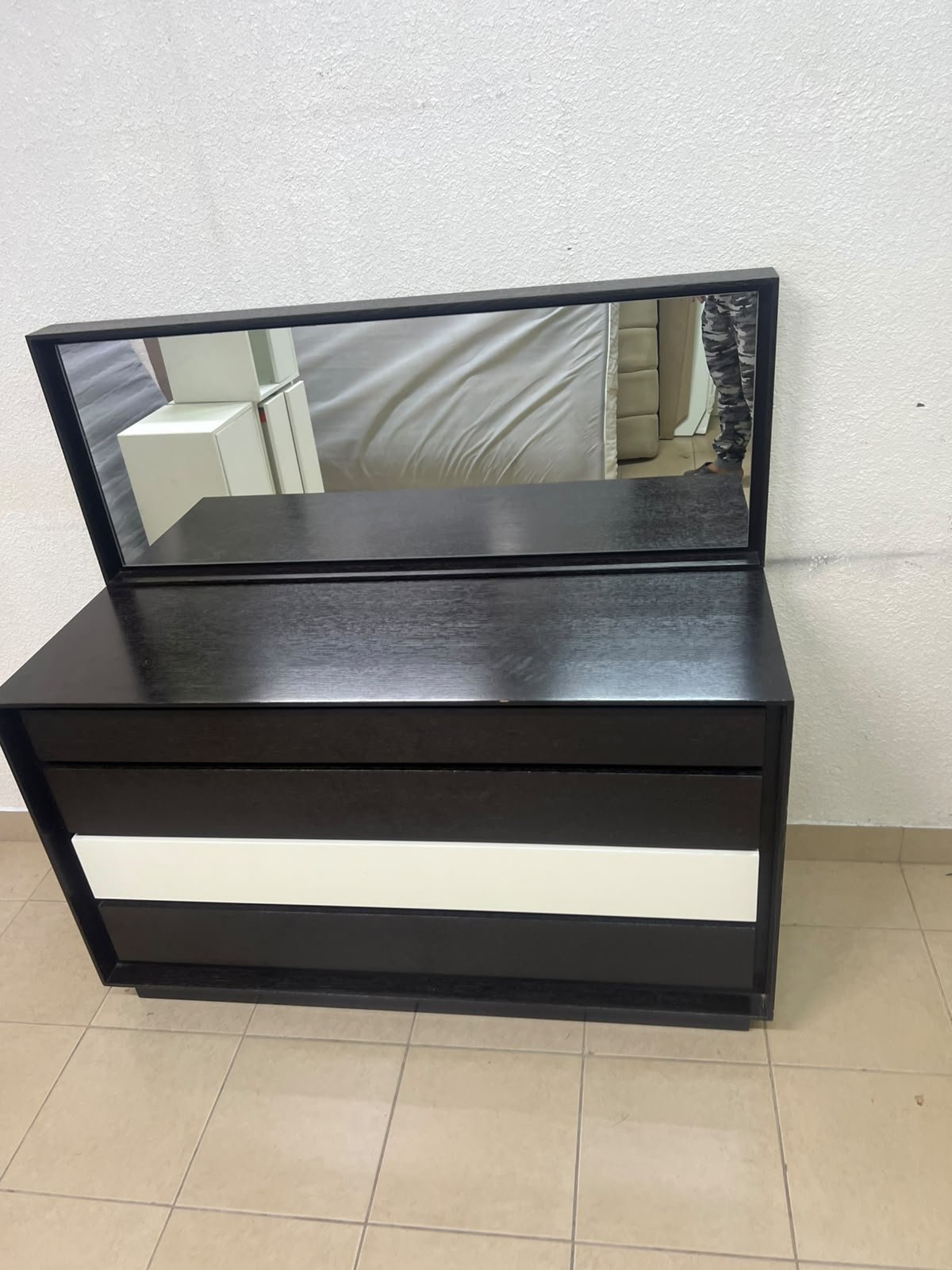A dark brown wooden dresser featuring a wide white central drawer, accompanied by a large mirror with a matching rectangular frame. - Image 7
