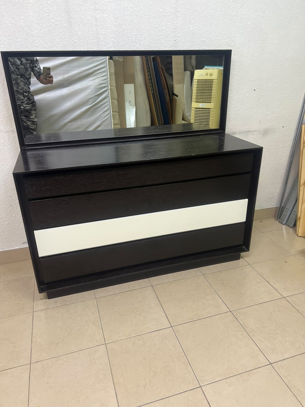 A dark brown wooden dresser featuring a wide white central drawer, accompanied by a large mirror with a matching rectangular frame. - Image 8