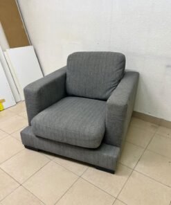 This is a single-seater chair (armchair) featuring a modern design, upholstered in gray fabric, with wide, square armrests. - Image 4