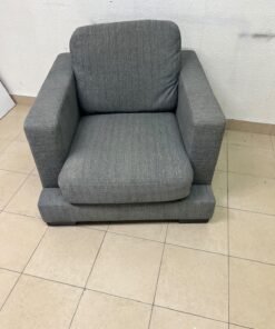 This is a single-seater chair (armchair) featuring a modern design, upholstered in gray fabric, with wide, square armrests. - Image 5