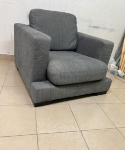 This is a single-seater chair (armchair) featuring a modern design, upholstered in gray fabric, with wide, square armrests. - Image 6