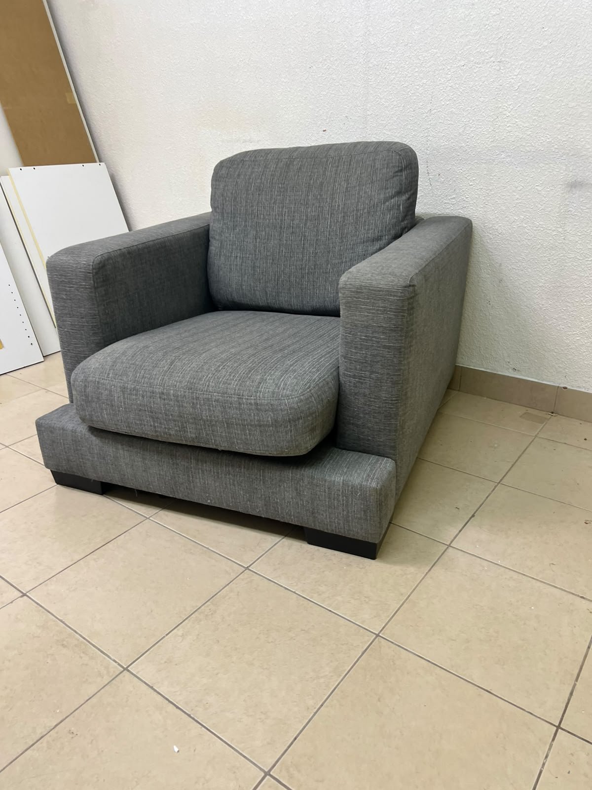 This is a single-seater chair (armchair) featuring a modern design, upholstered in gray fabric, with wide, square armrests. - Image 7