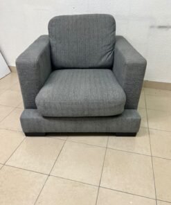 This is a single-seater chair (armchair) featuring a modern design, upholstered in gray fabric, with wide, square armrests. - Image 8