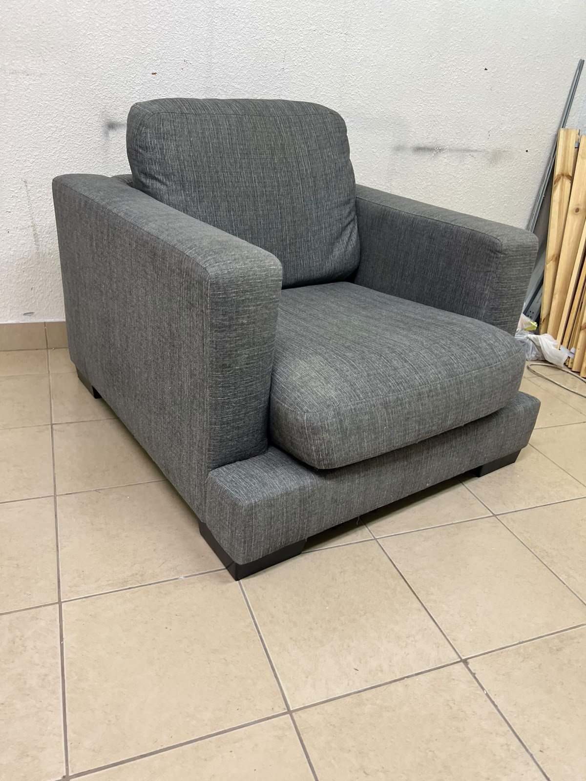 This is a single-seater chair (armchair) featuring a modern design, upholstered in gray fabric, with wide, square armrests. - Image 10