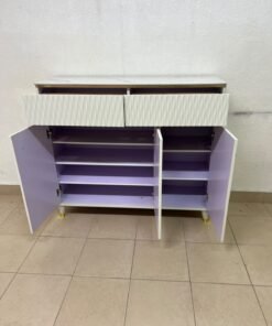 A white shoe cabinet or entryway storage unit (console) featuring a modern design, ribbed upper drawers, and gold accents on the handles and legs. - Image 4