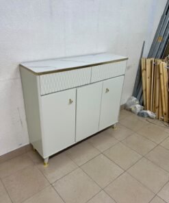 A white shoe cabinet or entryway storage unit (console) featuring a modern design, ribbed upper drawers, and gold accents on the handles and legs. - Image 11