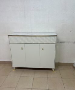 A white shoe cabinet or entryway storage unit (console) featuring a modern design, ribbed upper drawers, and gold accents on the handles and legs. - Image 8