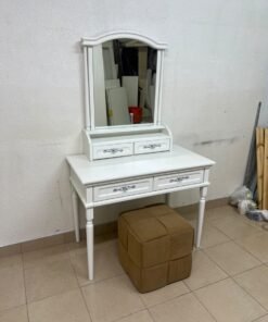 A white vanity table featuring a mirror and both upper and lower drawers, accompanied by a square brown stool upholstered in mesh fabric. - Image 2